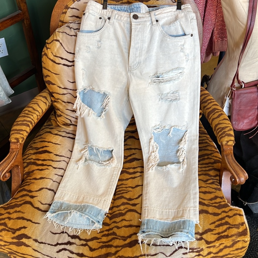 1 teaspoon very distressed, crop denim size 28.
